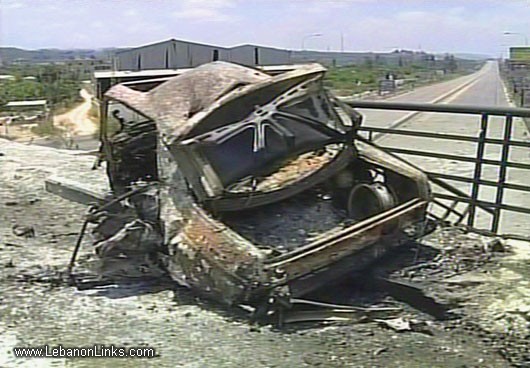Photo of Car Destroyed on Highway
